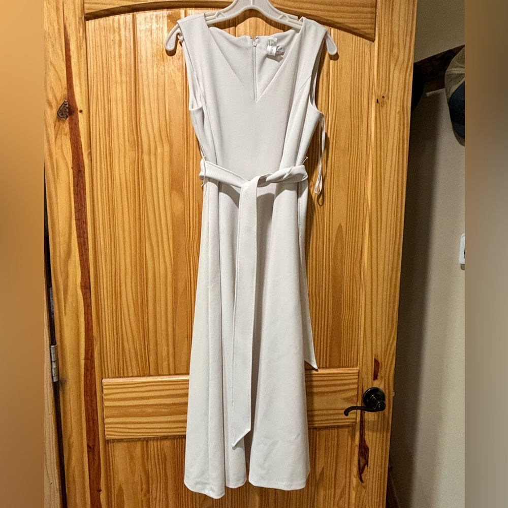 White Calvin Klein dress. Size 10 has pockets.